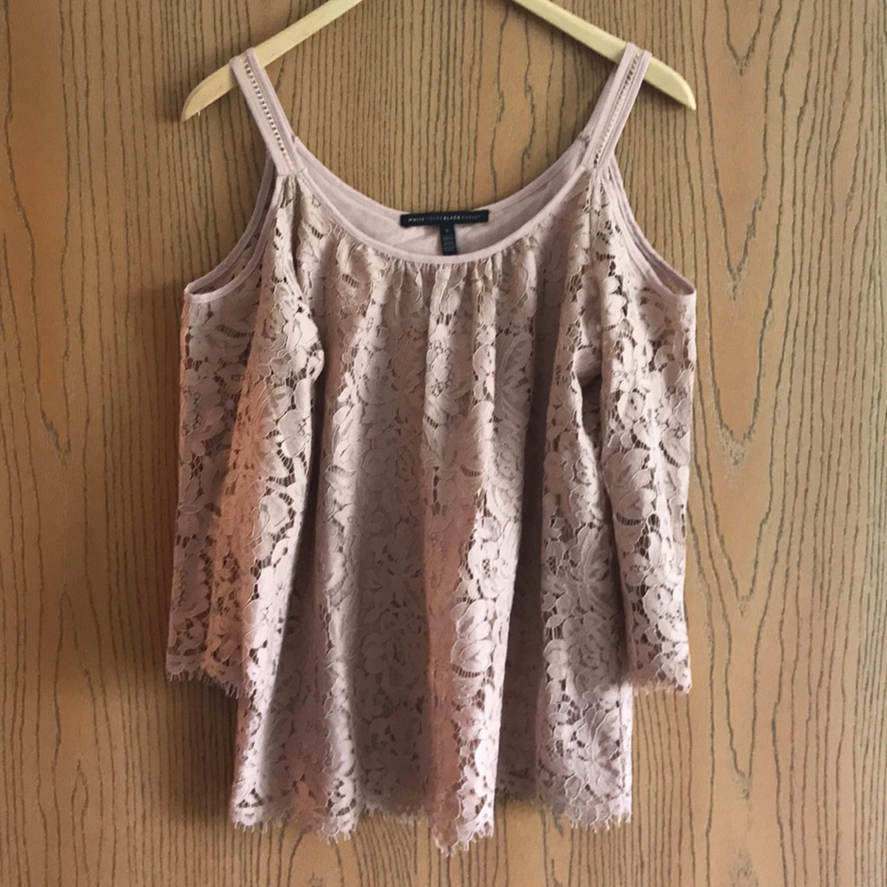 Lace blouse with shoulder cutouts